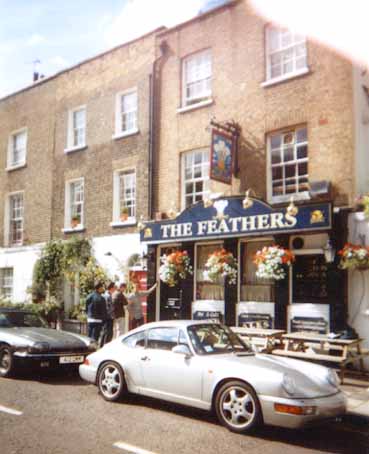 Some expensive cars (and a pub)